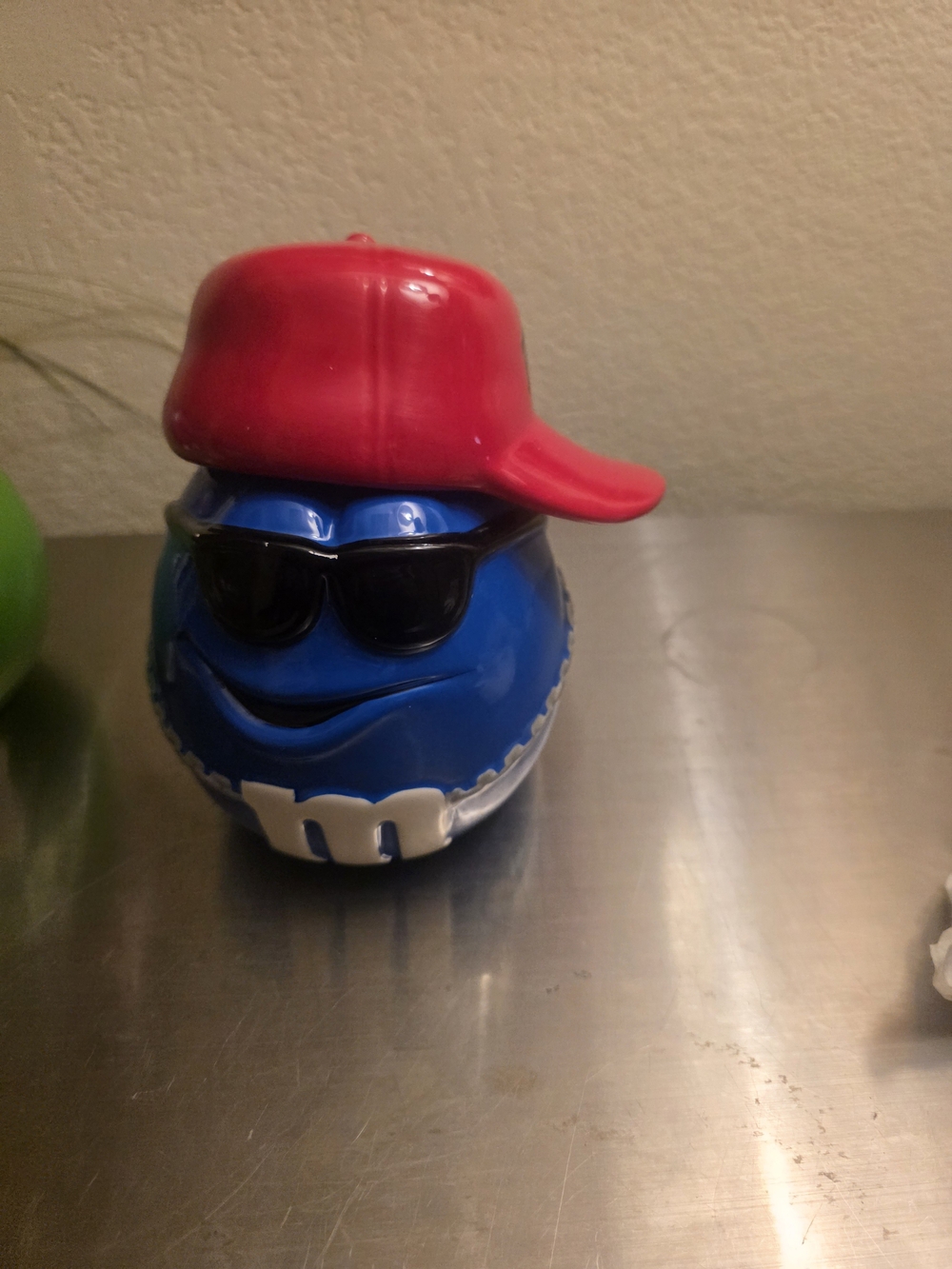 M&M'S Blue Character Player with Red Cap and Black Sunglasses